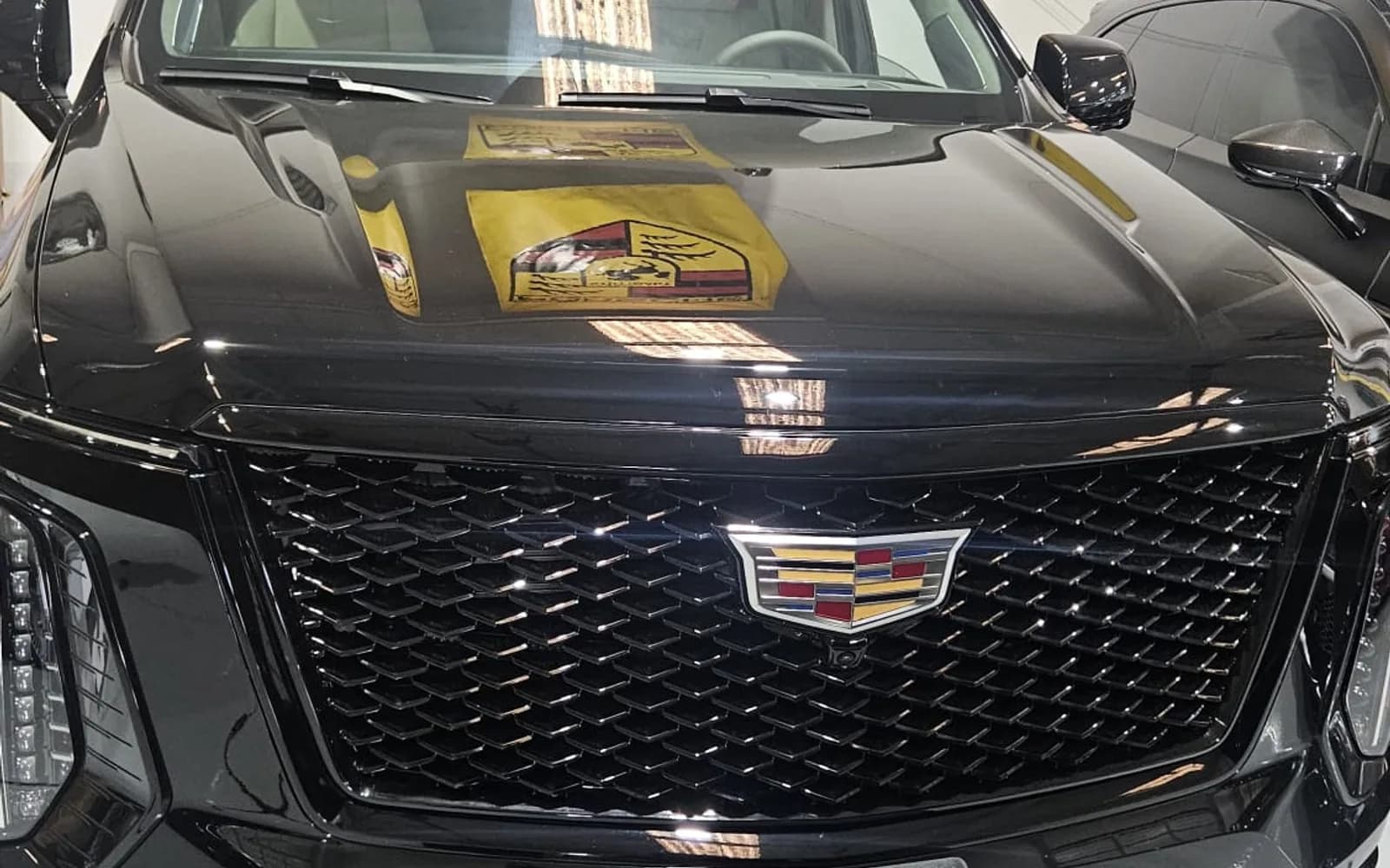 Black Cadillac Escalade with light interior